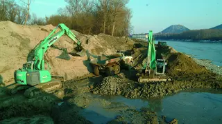 Bagger graben am Donauufer