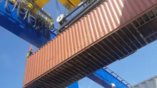 Crane with container