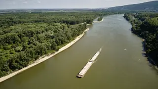 Aerial view, cargo vessel on the danube