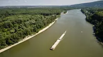Aerial view, cargo vessel on the danube