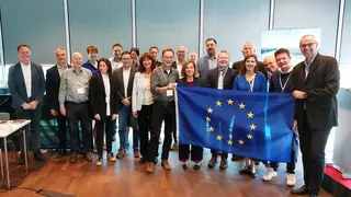 Group photograph, Cinea Advisory Group with EU-flag