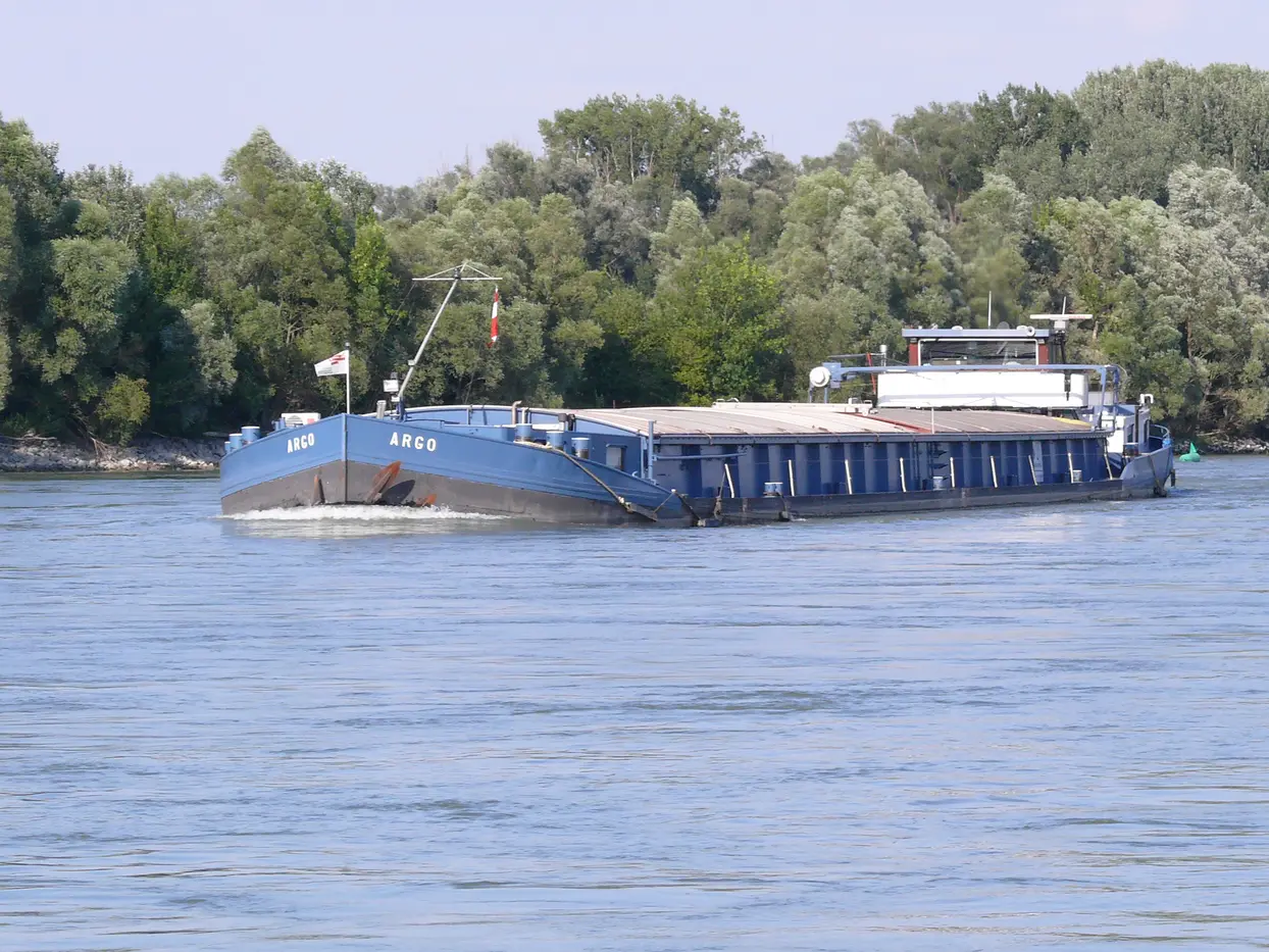 Cargo vessel on the river